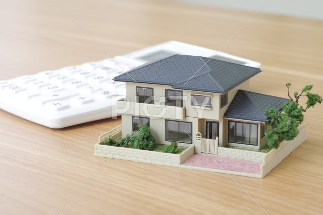 一戸建ての住宅とお金に関するイメージ