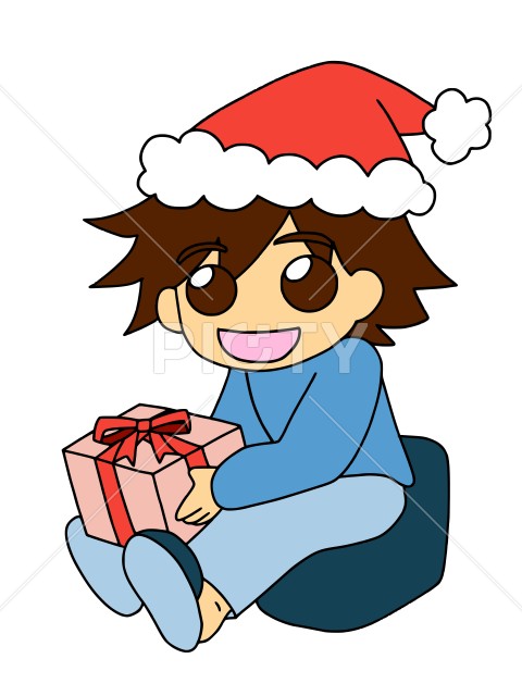 クリスマスにプレゼントを抱えてくつろぐ男の子